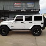 2012 Jeep Wrangler Sahara Altitude edition with Teraflex suspension lift, Moto Metal 18" wheels, and Nitto 35" Trail Grappler tires.