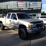 GMC Sierra with Zone 6" suspension lift, ATX wheels, Nitto Terra Grappler tires and Smittbilt Bull Bar.